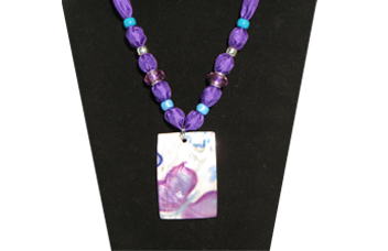 Closeup of Purple Necklace with Shell Pendant