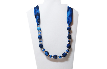 Christmas necklace in midnight blue with silver beads.