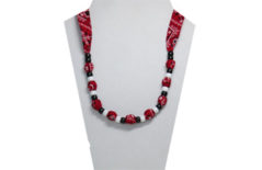 Cute cotton necklace made with red bandana cotton fabric and pony peads.