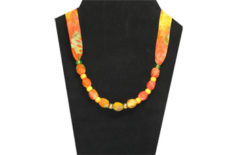 Bright orange and yellow necklace with pony beads